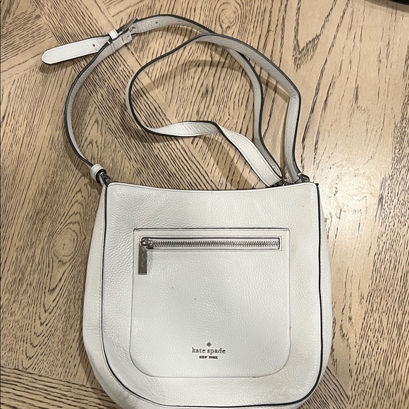 kate spade Handbags - Kate Spade Cream Crossbody Bag with Silver Accents